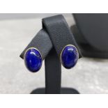 Ladies 18ct yellow gold lapis lazuli studs, featuring 2 oval lapis lazuli stones each set in a