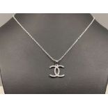 Silver and CZ Channel style pendant necklace