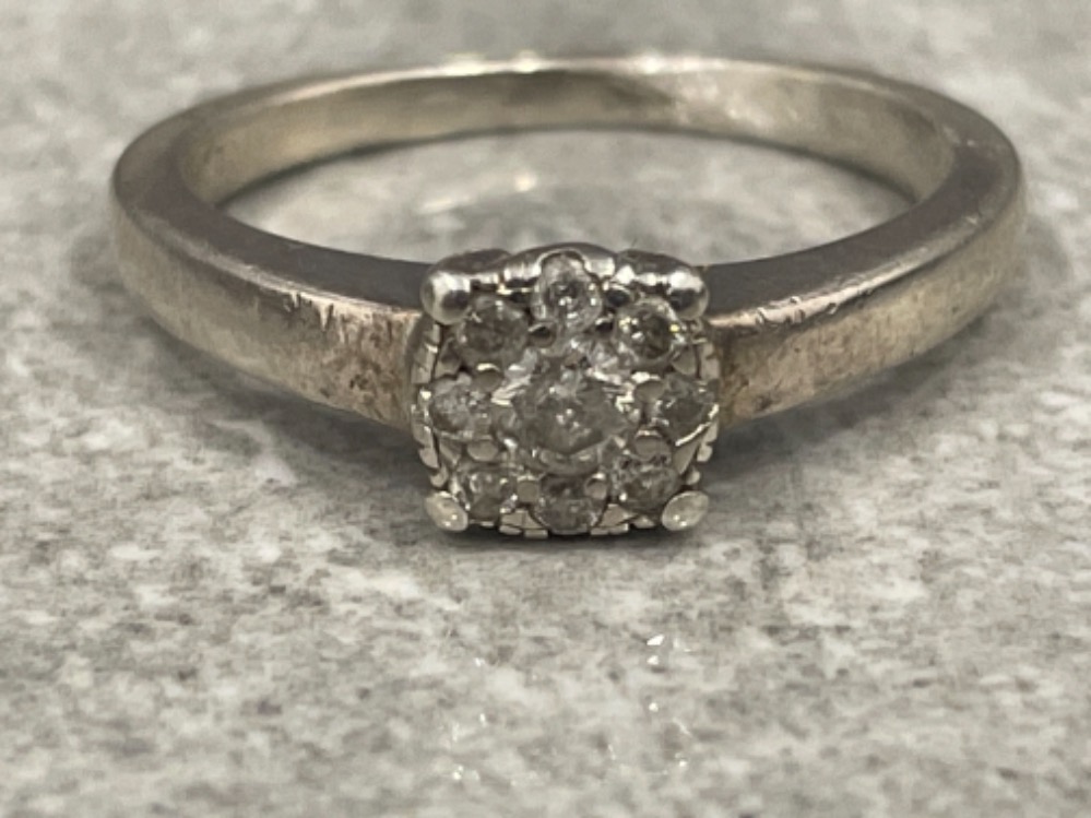 White gold Diamond cluster ring. Approx .25cts size M 3.2g