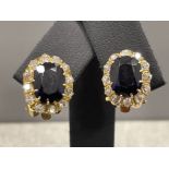 Pair of gold Sapphire and Diamond clip on earrings