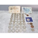 Forty George V silver half crowns, other coins and two bank notes.