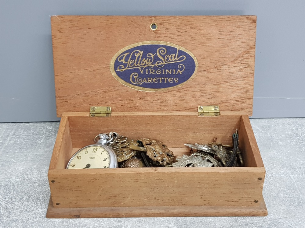 Wooden Yellow Soal Virginia Cigarettes box containing miscellaneous military badges and smiths
