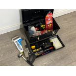 Plastic toolbox containing mixed locksmith tools