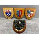4 wooden shields with motors of the family mowat Newcastle university and 2 others