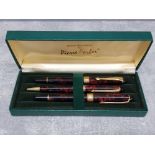 Pierre Farber pen set, two ball points and one fountain pen (needs attention), cased.