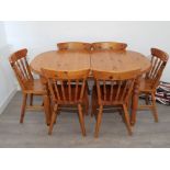 Pine extending dining table and 6 matching chairs 139x88cm