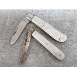 2 mother of pearl handled fruit knives, one with hallmarked silver blade