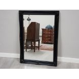 Bevelled black framed swept mirror, 75x106cm