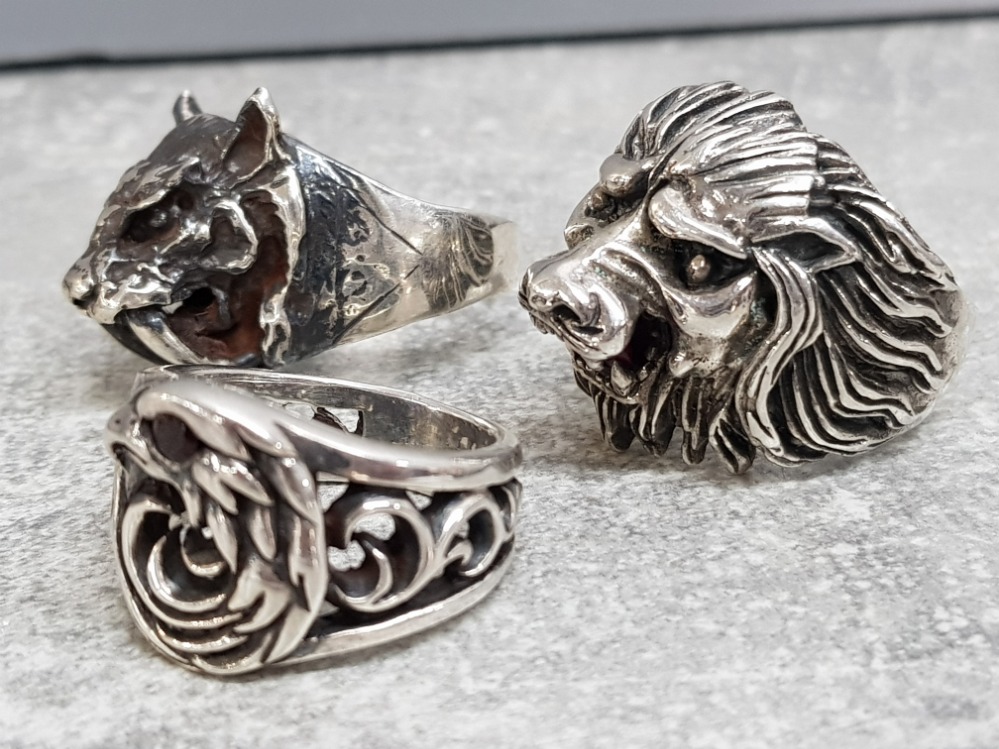 3 silver gents rings includes Eagle, lion with red stone and Smilodon (saber toothed tiger) 69.2g, - Image 2 of 2