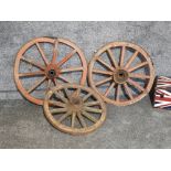 3 Antique red wagon wheels