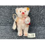 Steiff Bear 654572 “Girl 23” with tennis racket. In good condition and tags attached