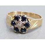 9k yellow gold ring with diamond and 6 sapphires, size N, 3.3g gross