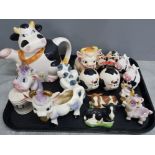 Tray of novelty porcelain items, all cows includes large teapot, creamer and a large quantity of