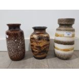 Three West Germany fat lava vases of various designs, largest 22cm high.