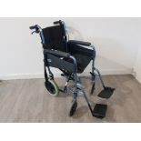 A Days folding wheelchair.