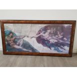 A large colour print of the creation of Adam by Michelangelo 67 x 150cm