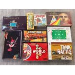 9 boxed vintage board games including tank battle, wide world and Trak-Check etc