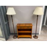 Reproduction mahogany 2 drawer bookshelves together with a pair of metal framed standard lamps
