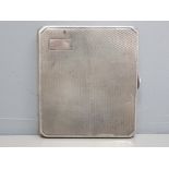 A George V silver cigarette case with engraved decoration by D Bros, Birmingham 1931, 106g gross