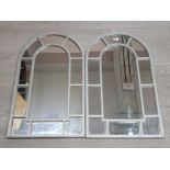 A pair of wall mirrors.