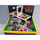 Crate containing a large Quantity of rubiks cubes, different shapes and sizes