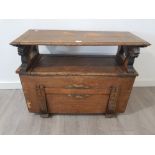 A 1950s oak veneer Monks bench (poor condition).