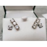 Two pairs of CZ & silver stud earrings