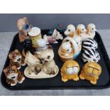 Tray of vintage salt and pepper shakers, including garfield pair, cats and dogs