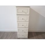 A tall narrow chest of five drawers 41.5 x 120 x 42.5cm