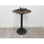 Vintage cast iron bird bath with figural bird