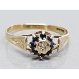 9k yellow gold dring with diamond and 8 sapphires, size N, 1.1g gross