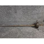 An antique sword with guard and metal grip.