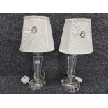 A pair of table lamps with diamante decorated shades 42cm high.