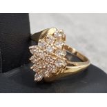 Ladies 14ct yellow gold diamond cluster ring featuring, 16 round brilliant cut diamonds set in a