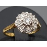 18ct yellow and white gold diamond cluster ring, with 9 round brillaint cut diamonds, 3.3g gross,