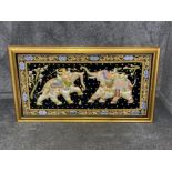 Large Indian framed wall hanging depicting Warriors on Elephants. 165cm x 92cms