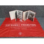 Sir Bobby Charlton books x2 and flag