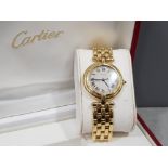 18ct yellow gold Cartier watch with case, quartz movement, blue spinel button, complete woth