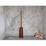 A mid 20th century mahogany coat and unbrella stand.