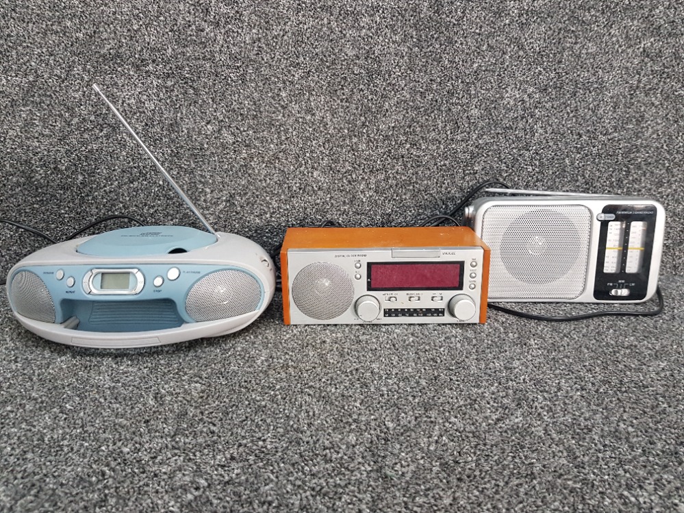 2 Tesco radios together with a digital clock radio