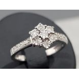 Ladies 9ct white gold cluster ring with 15 diamonds, apx. 15ct, 2.6g gross, size K