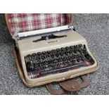 Vintage Olivetti Lattera 22 typewriter in original carry case