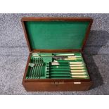 A Walker & Hall part canteen of silver plated cutlery, two lift out trays, in oak case, with key.