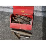 Red metal Halfords tool box containing miscellaneous vintage handtools including chisels, spanners