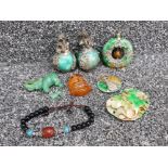 Bag of Tibetan silver and jade items, including elephant and foo dogs