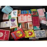 Small case containing a large Quantity of vintage novelty playing cards