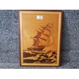 A marquetry picture by Bob Neale, three masted ship at sea, 39.5 x 29.5cm.