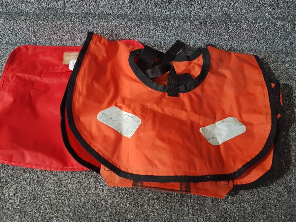 An RLNI child's inflatable life jacket with bag.