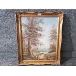 An oil painting by R Miller, woodland scene 50 x 39cm.
