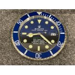 Wall clock in the style of Rolex Deepsea in good condition 34cms